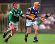13 April 1997; Liam Cahill of Tipperary in action against Mike Houlihan of Limerick during the National Hurling League Division 1 match between Limerick v Tipperary at the Gaelic Grounds in Limerick. Photo by Brendan Moran/Sportsfile
