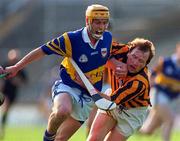 31 May 1997; Liam Cahill of Tipperary gets past the challenge of Willie O'Connor of Kilkenny during the National Hurling League Division 1 between Tipperary and Kilkenny at Semple Stadium in Thurles, Tipperary. Photo by Brendan Moran/Sportsfile