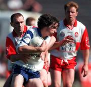 1 June 1997; Mark Daly of Monaghan evades the challenge of David O'Neill of Derry during the Ulster GAA Football Senior Championship Quarter-Final between Monaghan and Derry at St. Tiernach's Park in Clones. Photo by Ray McManus/Sportsfile
