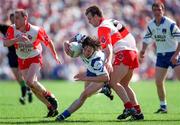 1 June 1997; Mark Daly of Monaghan in action against Karl Diamond of Derry during the Ulster GAA Football Senior Championship Quarter-Final between Monaghan and Derry at St. Tiernach's Park in Clones. Photo by Ray McManus/Sportsfile