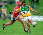 9 June 1996; Martin Daly of Offaly in action against Seamus O'Hanlon of Louth during the Leinster Senior Football Championship Quarter-Final between Louth and Offaly at Pairc Tailteann in Navan. Photo by Brendan Moran/Sportsfile