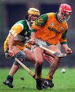 18 May 1997; Martin Massey of Meath in action against Ger Oakley of Offaly during the Leinster Senior Hurling Championship Preliminary Round match between Offaly and Meath at Cusack Park in Mullingar. Photo by Ray McManus/Sportsfile