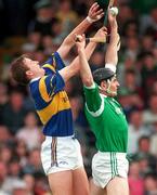 13 April 1997; Mike Nash of Limerick in action against Brian O'Mera of Tipperary during the National Hurling League Division 1 match between Limerick v Tipperary at the Gaelic Grounds in Limerick. Photo by Brendan Moran/Sportsfile