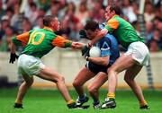 28 July 1996; Paul Curran of Dublin is tackled by Trevor Giles and John McDermott of Meath during the Leinster Senior Football Championship Final between Dublin and Meath in Croke Park, Dublin. Photo by Ray McManus/Sportsfile