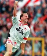 30 June 1996; Peter Canavan of Tyrone celebrates after scoring his side's first goal during the Ulster Senior Football Championship Semi-Final between Tyrone and Derry at St. Tiernach's Park in Clones. Photo by David Maher/Sportsfile