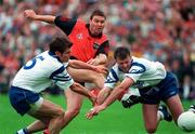 23 June 1996; Peter Withnell of Down has a shot on goal despite the efforts of Dermot Duffy, left, and Gerard McGurk of Monaghan during the  Ulster GAA Senior Football Championship Quarter-Final between Monaghan and Down at St. Tiernach's Park in Clones. Photo by David Maher/Sportsfile