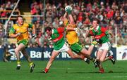 29 September 1996; Tommy Dowd of Meath in action against Kenneth Mortimer, left, and James Nallen of Mayo during the GAA All-Ireland Senior Football Championship Final replay between Meath and Mayo at Croke Park in Dublin. Photo by Brendan Moran/Sportsfile