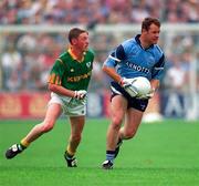 28 July 1996; Vinny Murphy of Dublin races clear of Trevor Giles of Meath during the Leinster Senior Football Championship Final match between Dublin and Meath at Croke Park in Dublin. Photo by Ray McManus/Sportsfile