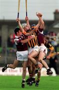 19 September 1999; Aidan Cummins of Kilkenny in action against Eamon Donoghue, left, and Shane Lawless of Galway during the All-Ireland U21 Hurling Championship Final between Kilkenny and Galway at O'Connor Park in Tullamore, Offaly. Photo by Brendan Moran/Sportsfile