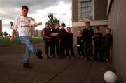 17 September 1999; Alan Kinsella who recently signed with Leeds united kicks a football near his home in Ballymun, Dublin. Photo by David Maher/Sportsfile