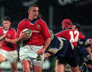 5 November 1999; Alan Quinlan of Munster is tackled by Declan O'Brien of Leinster during the Guinness Interprovincial Championship match between Leinster and Munster at Donnybrook Stadium in Dublin. Photo by Damien Eagers/Sportsfile