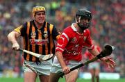 12 September 1999; Ben O'Connor of Cork, in action against Canice Brennan of Kilkenny during the Guinness All-Ireland Senior Hurling Championship Final between Cork and Kilkenny at Croke Park in Dublin. Photo by David Maher/Sportsfile