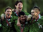 25 July 1999; Republic of Ireland players, from left, Richie Baker, Clive Delaney, back, Jason Gavin and Graham Barrett celebrate after receiving their medals following the UEFA European U18 Championship Finals Third Place Match between Greece and Republic of Ireland at Folkungavallen Stadium in Linköping, Sweden. Photo by David Maher/Sportsfile