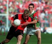 26 September 1999; Michael Walsh of Down in action against Paul Coady of Mayo during the All-Ireland Minor Football Final between Down and Mayo at Croke Park in Dublin. Photo by Matt Browne/Sportsfile