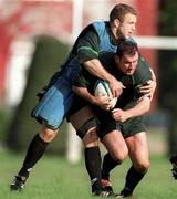12 October 1999; Eric Elwood is tackled by Kevin Maggs during an Ireland Rugby training session at King's Hospital in Palmerstown, Dublin. Photo by Matt Browne/Sportsfile