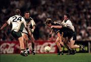 15 October 1999; Scott West of Australia in action against Jarlath Fallon of Ireland with the support of team-mates Ciaran Whelan and Brian Stynes, 24, during the International Rules Series Second Test match between Ireland and Australia at Football Park in Adelaide, Australia. Photo by Ray McManus/Sportsfile
