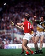 2 September 1984; Jimmy Barry Murphy of Cork in action against Eugene Coughlan and Pat Fleury of Offaly during All-Ireland Senior Hurling Championship Final at Semple Stadium in Thurles, Tipperary. Photo by Ray McManus/Sportsfile