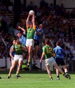 1 August 1999; John McDermott of Meath fields the ball ahead of Brian Stynes of Dublin during the Bank of Ireland Leinster Senior Football Championship Final at Croke Park in Dublin. Photo by Brendan Moran/Sportsfile