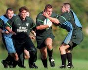 12 October 1999; Justin Fitzpatrick is tackled by Andy Ward, right, and Kieron Dawson, left, during an Ireland Rugby training session at King's Hospital in Palmerstown, Dublin. Photo by Matt Browne/Sportsfile