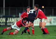 5 November 1999; Peter McKenna of Leinster is tackled by Anthony Foley, left, Ronan O'Gara and and David Wallace, right, of Munster during the Guinness Interprovincial Championship match between Leinster and Munster at Donnybrook Stadium in Dublin. Photo by Damien Eagers/Sportsfile