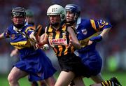 5 September 1999; Lizzie Lyng of Kilkenny in action against Una O'Dwyer of Tipperary during the Bórd na Gaeilge All-Ireland Senior Camogie Championship Final between Tipperary and Kilkenny at Croke Park in Dublin. Photo by Aoife Rice/Sportsfile