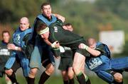 12 October 1999; Malcolm O'Kelly is tackled by Andy Ward, left, and Gordon D'Arcy, right, during an Ireland Rugby training session at King's Hospital in Palmerstown, Dublin. Photo by Matt Browne/Sportsfile