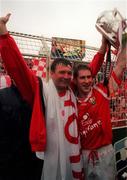 12 September 1999; Cork manager Jimmy Barry Murphy, left, and captain Mark Landers celebrate with the Liam MacCarthy Cup following the Guinness All-Ireland Senior Hurling Championship Final between Cork and Kilkenny at Croke Park in Dublin. Photo by David Maher/Sportsfile