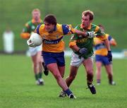 31 October 1999; Mark O'Connell of Clare in action against Paddy Reynolds of Meath during the Church & General National Football League Division 1B match between Meath and Clare at Páirc Tailteann in Navan, Meath. Photo by Aoife Rice/Sportsfile