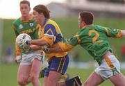 31 October 1999; Mark O'Connell of Clare is tackled by Mark O'Reilly of Meath during the Church & General National Football League Division 1B match between Meath and Clare at Páirc Tailteann in Navan, Meath. Photo by Aoife Rice/Sportsfile