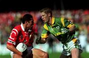26 September 1999; Seán Óg O hAilpín of Cork in action against Graham Geraghty of Meath during the Bank of Ireland All-Ireland Senior Football Championship Final between Meath and Corkat Croke Park in Dublin. Photo by Ray Lohan/Sportsfile