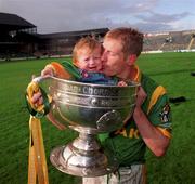 26 September 1999; Meath captain Graham Geraghty celebrates with his daughter Sophia and the Sam Maguire Cup following the Bank of Ireland All-Ireland Senior Football Championship Final match between Meath amd Cork at Croke Park in Dublin. Photo by Ray McManus/Sportsfile
