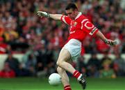 26 September 1999; Joe Kavangh of Cork shoots to score his side's goal during the Bank of Ireland All-Ireland Senior Football Championship Final match between Meath and Cork at Croke Park in Dublin. Photo by Brendan Moran/Sportsfile