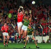 26 September 1999; Nicholas Murphy of Cork in action against John McDermott of Meath during the Bank of Ireland All-Ireland Senior Football Championship Final between Meath and Cork at Croke Park in Dublin. Photo by Brendan Moran/Sportsfile