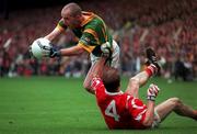 26 September 1999; Ollie Murphy of Meath in action against Anthony Lynch of Cork during the Bank of Ireland All-Ireland Senior Football Championship Final between Meath and Cork at Croke Park in Dublin. Photo by Ray Lohan/Sportsfile