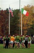 17 October 1999; The Meath team huddle together beneath the Irish and Americian flags at half-time of an Exhibition Match between Meath and Cork at the Irish Cultural Centre in Canton, Massachusetts, USA. Photo by Damien Eagers/Sportsfile