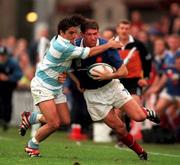 24 October 1999; Olivier Magne of France is tackled by Agustin Pichot of Argentina during the Rugby World Cup Quarter-Final match between France and Argentina at Lansdowne Road in Dublin. Photo by Brendan Moran/Sportsfile