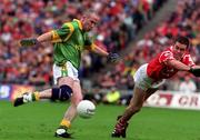 26 September 1999; Ollie Murphy of Meath scores his side's goal despite the efforts of Martin Cronin of Cork during the Bank of Ireland All-Ireland Senior Football Championship Final between Meath and Cork at Croke Park in Dublin. Photo by Matt Browne/Sportsfile