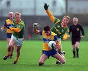 31 October 1999; Peadar McMahon of Clare in action against Trevor Giles with the support of his Meath team-mate Graham Geraghty, left, during the Church & General National Football League Division 1B match between Meath and Clare at Páirc Tailteann in Navan, Meath. Photo by Aoife Rice/Sportsfile