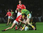 26 September 1999; Ronan McCarthy of Cork in action against Graham Geraghty of Meath during the Bank of Ireland All-Ireland Senior Football Championship Final between Meath and Cork at Croke Park in Dublin. Photo by Ray Lohan/Sportsfile