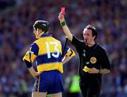 15 August 1999; Clare's Stephen McNamara receives the red card from referee Willie Barrett during the Guinness All-Ireland Senior Hurling Championship Semi-Final match between Kilkenny and Clare at Croke Park in Dublin. Photo by Ray McManus/Sportsfile