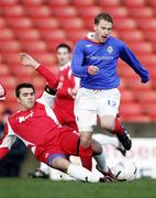 20 January 2007; Peter Thompson, Linfield, in action against Kevin Branniff, Portadown. Carnegie Premier League, Linfield v Portadown, Windsor Park, Belfast, Co. Antrim. Picture credit: Russell Pritchard / SPORTSFILE