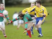 21 January 2007; James Callery, Roscommon, in action against Gary Mullins, Mayo. FBD Insurance League SF, Section A, Round 3, Mayo v Roscommon, Ballyhaunis, Co. Mayo. Picture credit: Brian Lawless / SPORTSFILE