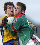 21 January 2007; Aidan Kilcoyne, Mayo, in action against Brian Mullin, Roscommon. FBD Insurance League SF, Section A, Round 3, Mayo v Roscommon, Ballyhaunis, Co. Mayo. Picture credit: Brian Lawless / SPORTSFILE