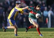 21 January 2007; David Brady, Mayo, in action against Brian Reynolds, Roscommon. FBD Insurance League SF, Section A, Round 3, Mayo v Roscommon, Ballyhaunis, Co. Mayo. Picture credit: Brian Lawless / SPORTSFILE