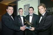 19 January 2007; Peter Hutton, Derry City, second from right, receives the eircom / Soccer Writers Association of Ireland Goalkeeper of the Year Award on behalf of his former team mate David Forde. Pictured with Michael Kennedy, far right, eircom Marketing Director, Neil O'Riordan, second from left, President of the Soccer Writers Association of Ireland, and Gerry McDermot, FAI. Soccer Writers Association of Ireland Annual Banquet, Park Inn Hotel, Dundalk, Co. Louth. Picture credit: David Maher / SPORTSFILE *** NO