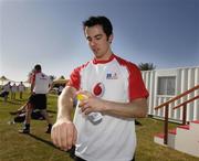 26 January 2007; Aaron Kernan, Armagh, applys sun block before squad training. Vodafone GAA All Stars Tour 2007, Dubai Polo and Equestrian Club, Arabian Ranches, Dubai, United Arab Emirates. Picture credit: Ray McManus / SPORTSFILE