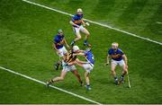 7 September 2014; Michael Fennelly, Kilkenny, in action against Tipperary players, left to right, James Woodlock, Brendan Maher, Cathal Barrett, and Pádraic Maher. GAA Hurling All Ireland Senior Championship Final, Kilkenny v Tipperary. Croke Park, Dublin. Picture credit: Dáire Brennan / SPORTSFILE