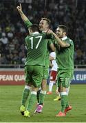 7 September 2014; Aiden McGeady, centre, Republic of Ireland, celebrates after scoring his side's second and winning goal with team-mate's Robbie Brady and Stephen Ward. UEFA EURO 2016 Championship Qualifer, Group D, Georgia v Republic of Ireland. Boris Paichadze National Arena, Tbilisi, Georgia. Picture credit: David Maher / SPORTSFILE