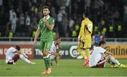 7 September 2014; Shane Long, Republic of Ireland, with dejected Georgian players at the end of the game. UEFA EURO 2016 Championship Qualifer, Group D, Georgia v Republic of Ireland. Boris Paichadze National Arena, Tbilisi, Georgia. Picture credit: David Maher / SPORTSFILE