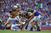 7 September 2014; Kilkenny players, from left, Michael Fennelly, TJ Reid, and Richie Hogan contest for possession with Tipperary players Shane McGrath and James Woodlock, right. GAA Hurling All Ireland Senior Championship Final, Kilkenny v Tipperary. Croke Park, Dublin. Picture credit: Brendan Moran / SPORTSFILE